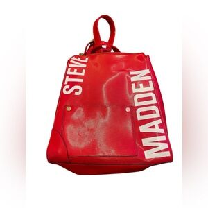 Steve Madden red shiny ribbed back pack. Practica new